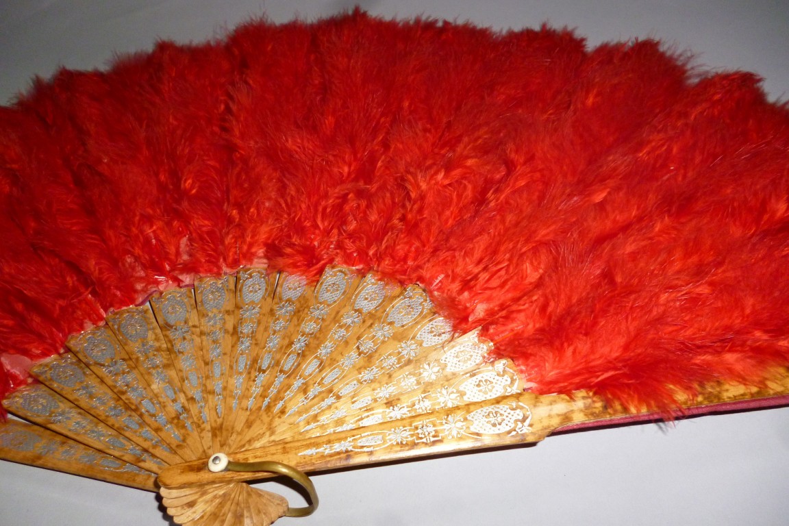 Red, feather fan, late 19th century