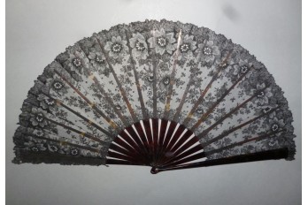 Black flowers, lace fan late 19th century