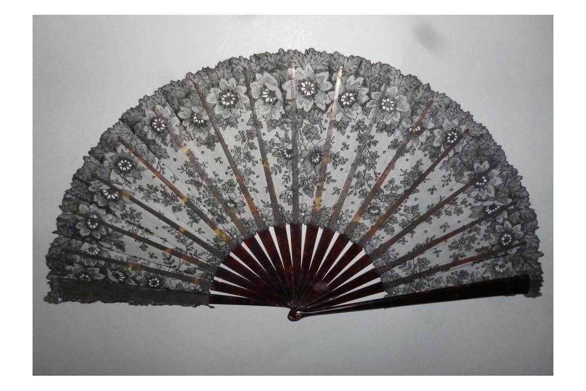 Black flowers, lace fan late 19th century