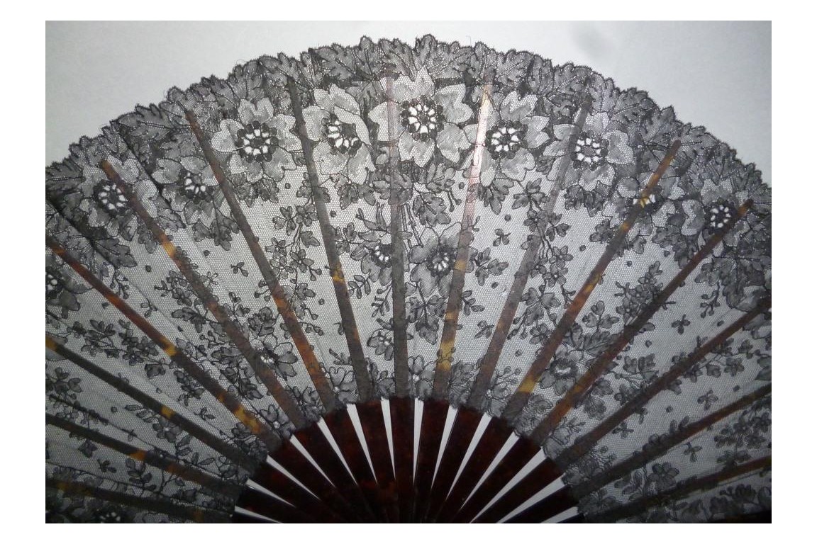 Black flowers, lace fan late 19th century