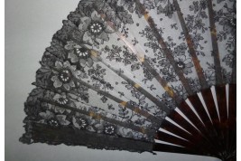 Black flowers, lace fan late 19th century