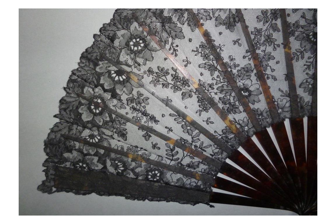 Black flowers, lace fan late 19th century