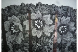 Black flowers, lace fan late 19th century