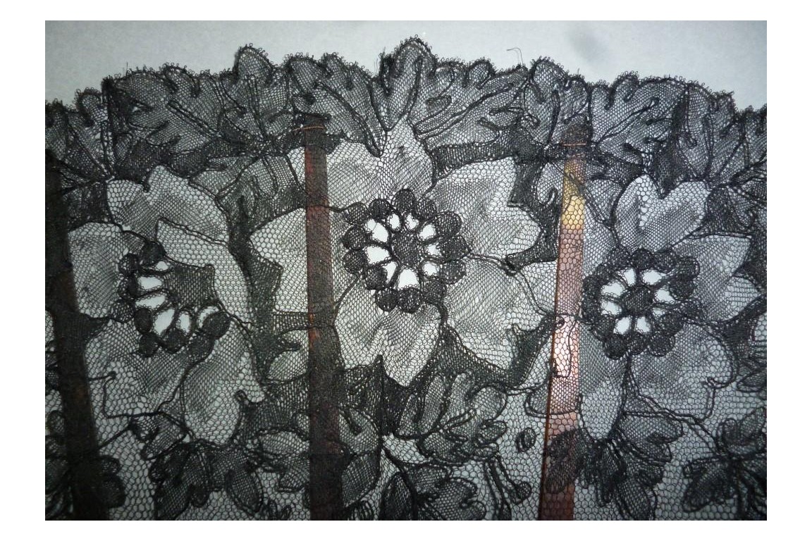 Black flowers, lace fan late 19th century