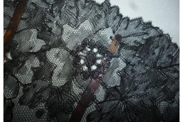 Black flowers, lace fan late 19th century