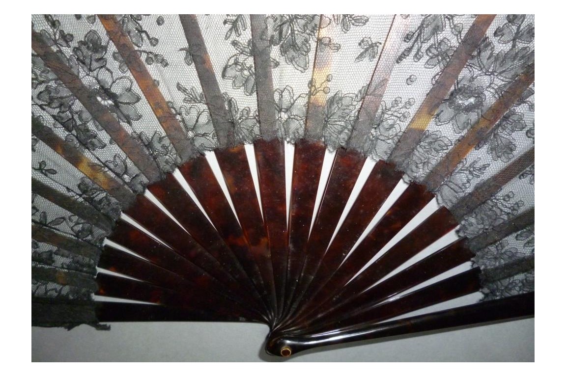 Black flowers, lace fan late 19th century