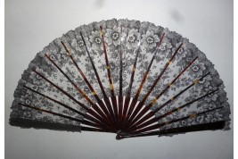Black flowers, lace fan late 19th century