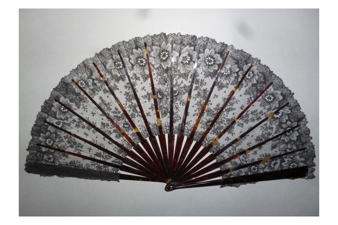 Black flowers, lace fan late 19th century