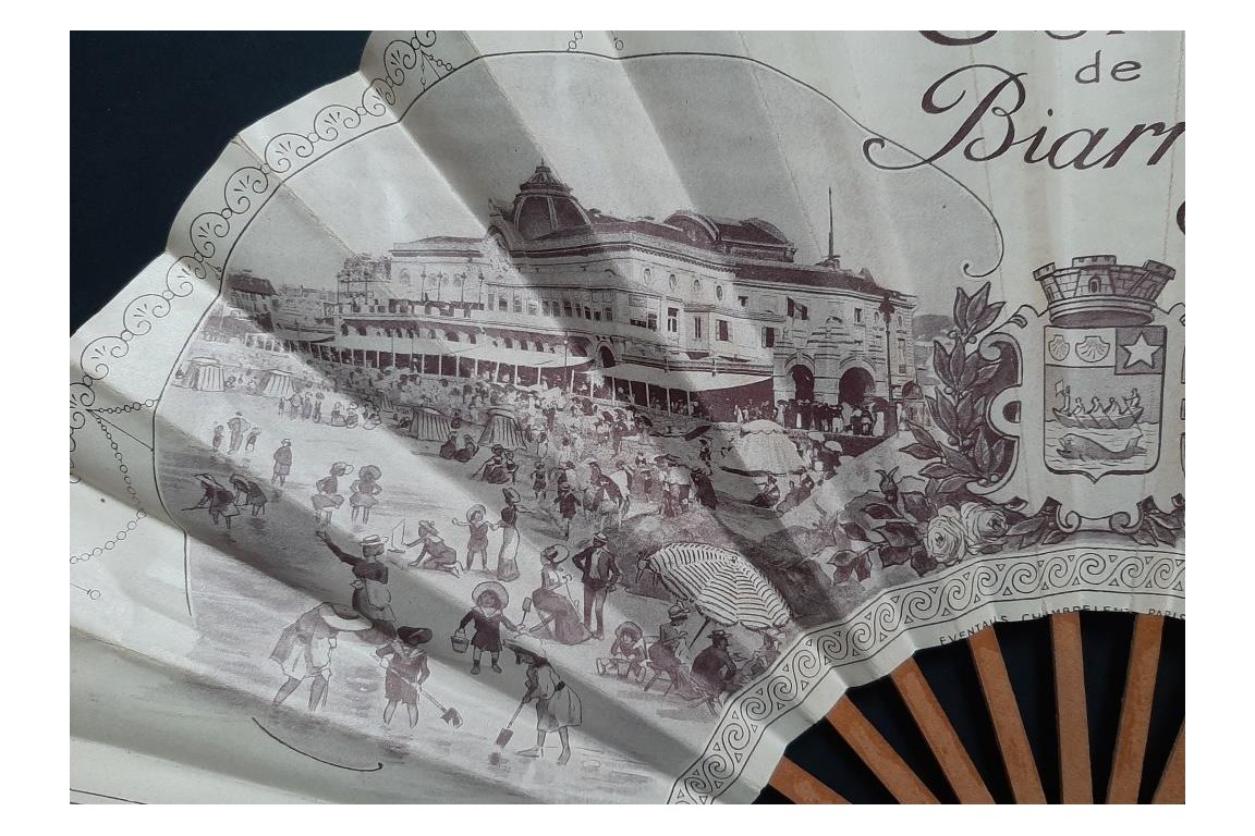 On the beach, two advertising fans, 20th century