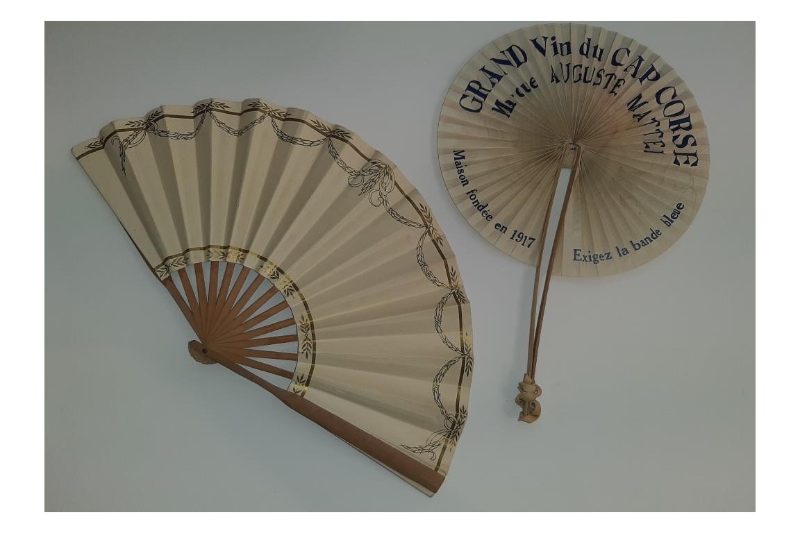 On the beach, two advertising fans, 20th century
