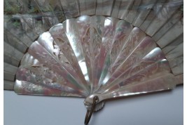 Colombine portraying Harlequin, fan circa 1870-80