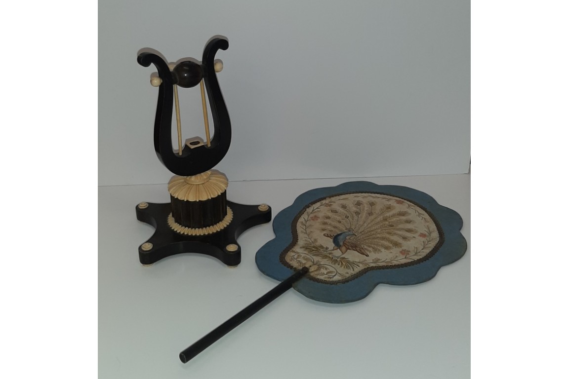 The music of the peacock, mid-19th century table fixed fan