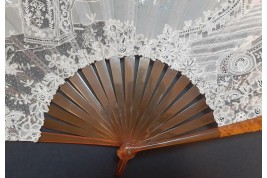 Sedan chair by Rodigue. Lace fan, circa 1890-95