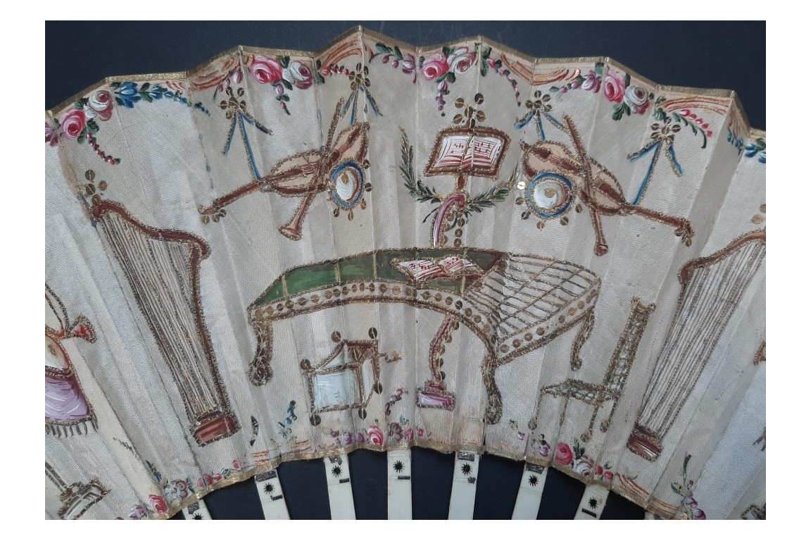 Musical instruments, fan circa 1780