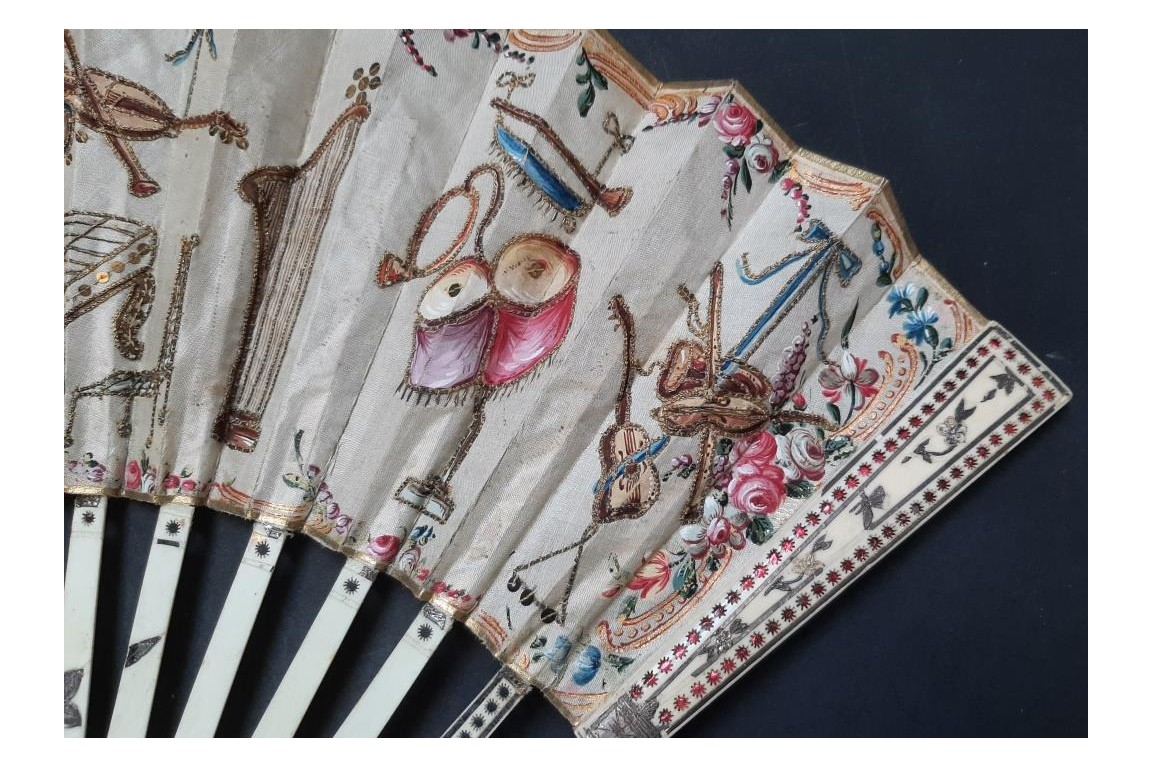 Musical instruments, fan circa 1780