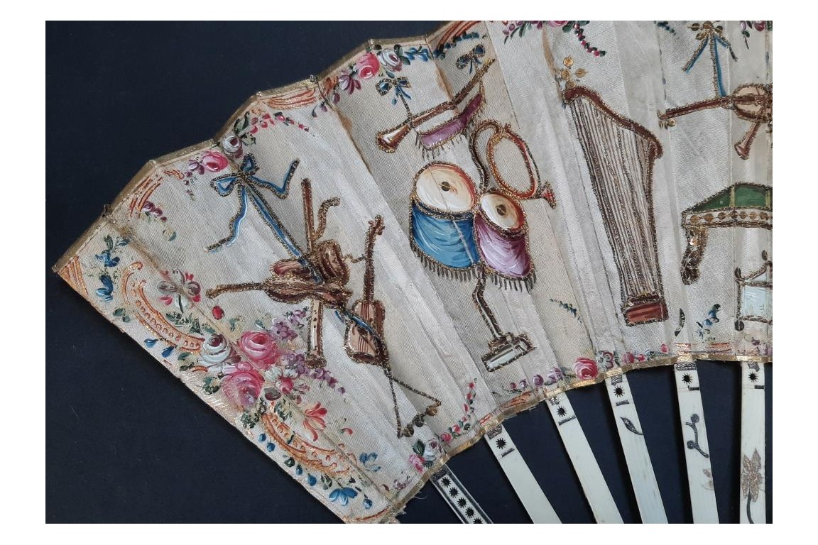 Musical instruments, fan circa 1780