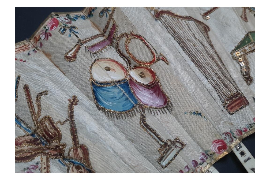 Musical instruments, fan circa 1780