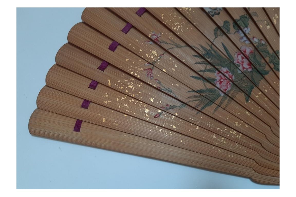 Pruning a pine tree, Japanese fan, Meiji era