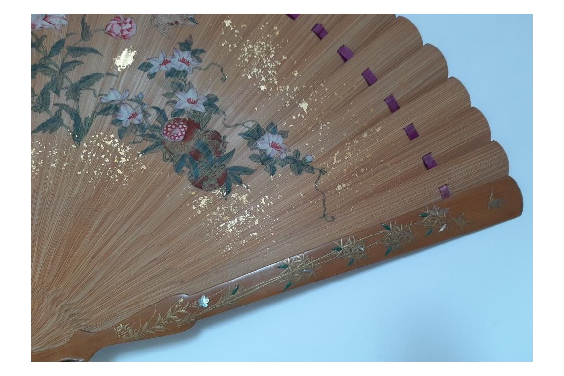 Pruning a pine tree, Japanese fan, Meiji era