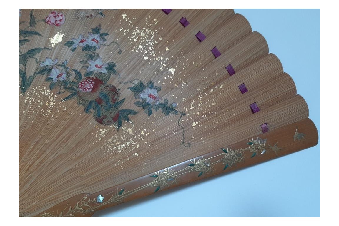 Pruning a pine tree, Japanese fan, Meiji era