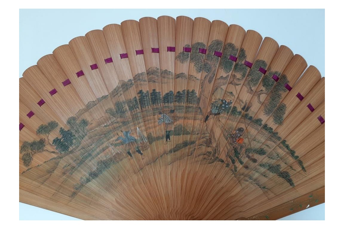 Pruning a pine tree, Japanese fan, Meiji era