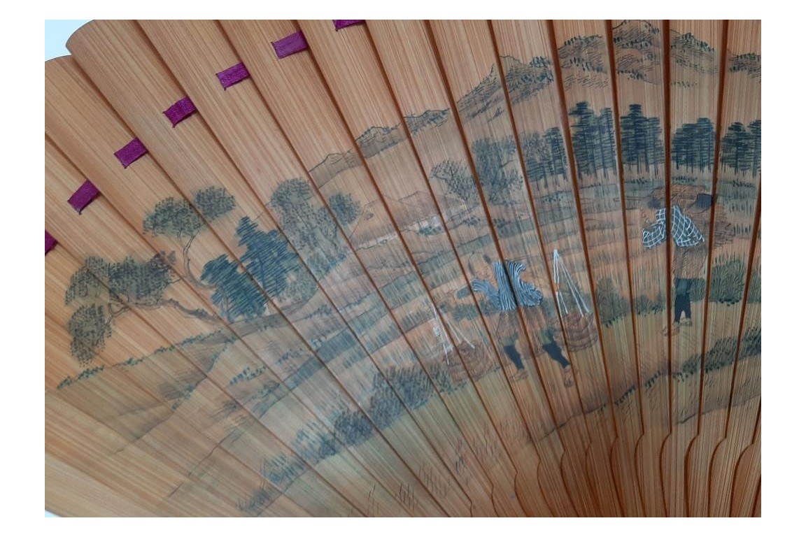 Pruning a pine tree, Japanese fan, Meiji era