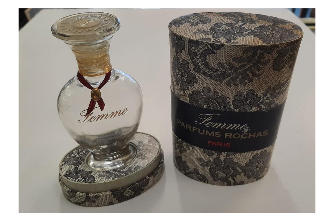 Femme, by Marcel Rochas. Perfum bottle and fan, circa 1948