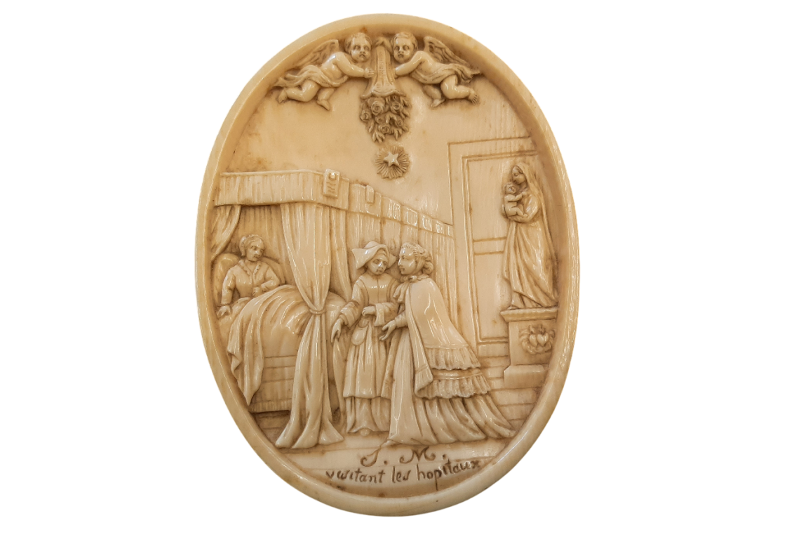 Empress Eugénie visiting the sick, medallion circa 1866