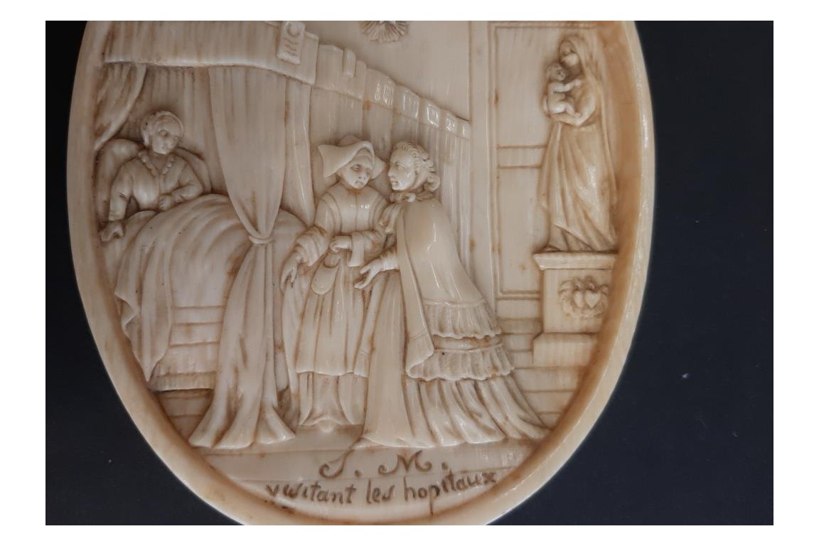 Empress Eugénie visiting the sick, medallion circa 1866