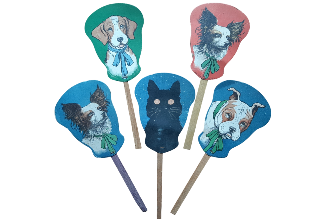 One cat and four dogs, advertising fixed fans for Kina Lillet and Ric-Ka