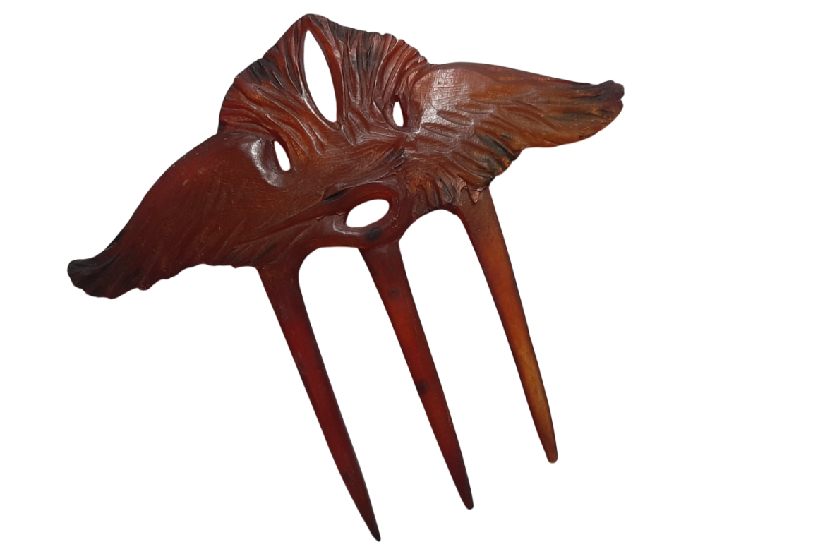 Heron, Art Nouveau comb