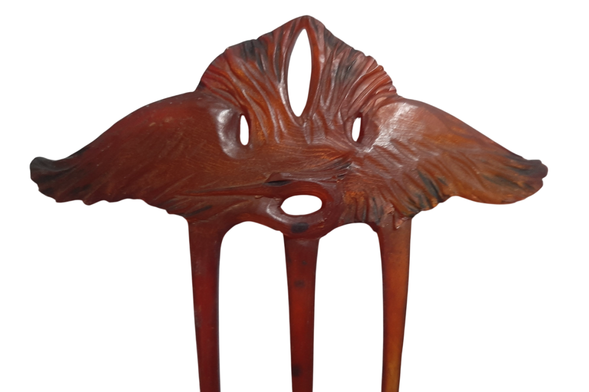 Heron, Art Nouveau comb